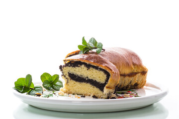 roll with poppy seeds inside on a white background