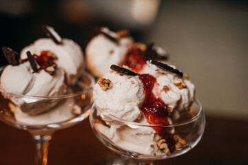 balls of ice cream in a beautiful glass dish