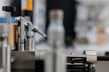 Fototapeta na wymiar Tool for pressure gauge to be calibrated. Steel instruments for metrology