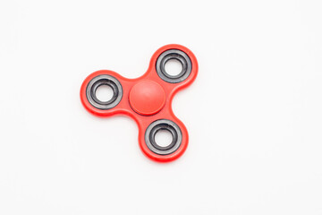 Fidget spinner toy isolated on white background.