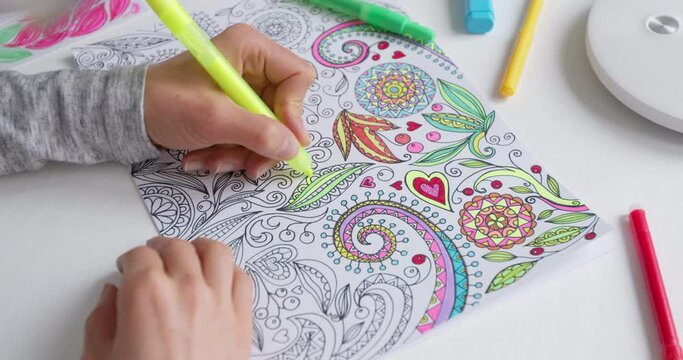 Coloring book, therapy for adults. Drawing as a hobby. Concentration activities to relieve stress. 4K.