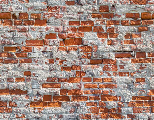 Seamless texture of destroyed weathered brick wall.