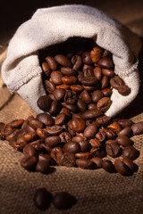 Small pouch made of natural linen with roasted coffee beans