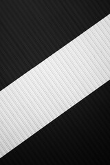 Black and white corrugated iron sheet used as a facade of a warehouse or factory. Texture of a seamless corrugated zinc sheet metal aluminum facade. Architecture. Metal texture.