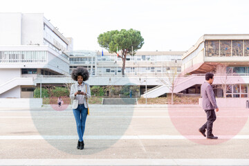 Graphic visualization of data exchanged by man and woman using smart phones outdoors