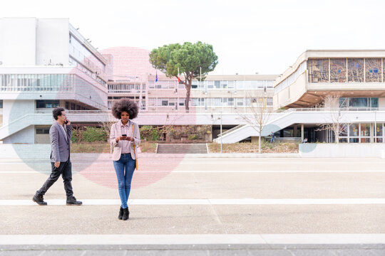 Graphic visualization of data exchanged by man and woman using smart phones outdoors