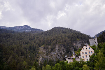 Fototapeta na wymiar Beautiful mountains landscape. The castle Fernstein in Alps, Austria .