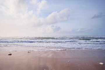 Beautiful sand ocean beach with waves.