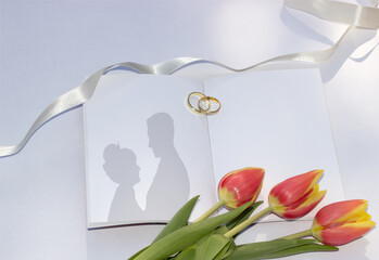 Blank wedding book rings tulips ribbon