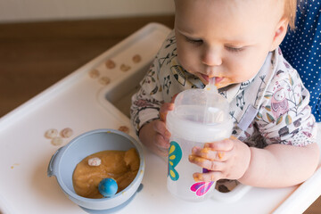 10 month old baby learning to drink out of straw cup: proper lip closure developing muscles for speech development