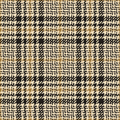 Plaid pattern abstract tweed in black, gold brown, beige. Seamless glen check houndstooth textured tartan vector for jacket, skirt, trousers, other spring autumn winter fashion fabric design.