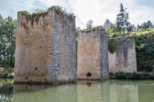 ruins of the old bridge at Lussac Les Chateaux in France