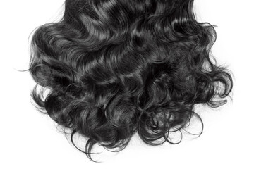 Black hair texture. Wavy long curly dark hair close up isolated on white. Hair extensions,...