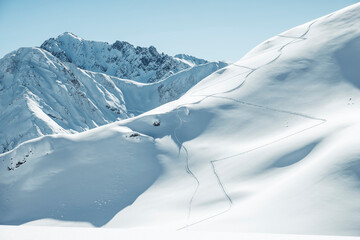 Ski tracks on snow covered Kreuzjoch mountain, Namloser Wetterspitze, Lechtal Alps, Tyrol, Austria