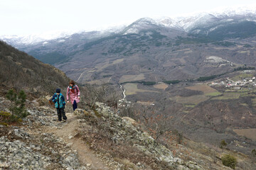 Fototapeta premium Mother and son hiking Bear mountain