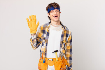 handyman housekeeper smiling happily, waving hand, welcoming and greeting you