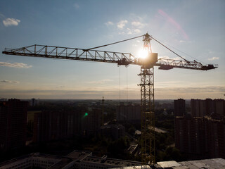 Building tower crane building a house