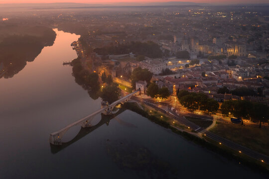 France, Provence-Alpes-Cote dAzur, Aerial view of river Rhone, Pont Saint-Benezet bridge and Palais des Papes at dawn