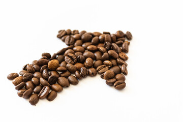 coffee beans on a white background in the shape of an arrow. coffee direction.