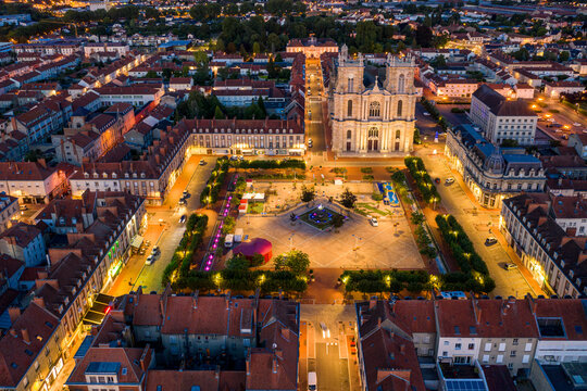 France, Marne, Vitry-le-Francois, Aerial view of illuminated square in front of Collegiale Notre-Dame De Vitry-Le-Francois church at dusk