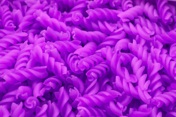 a lot of pasta. spiral noodles. noodles in a saucepan. cooking concept