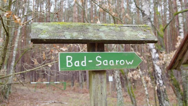 on a hiking trail in a whale stands the town of Bad Saarow. An abandoned hiking trail shows the way to the next village. 
