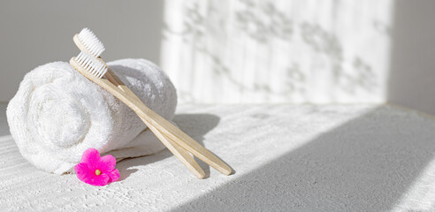 Bamboo brushes and towels . Light and shadows. Spa treatments. Concern for the environment . Bath treatments. Article about the spa .