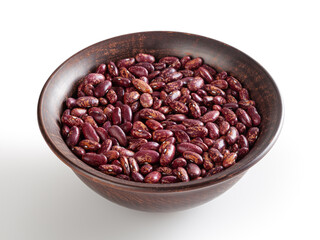 Red pinto beans in ceramic bowl isolated on white background with clipping path