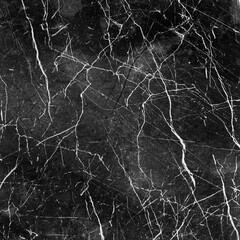 Black and white marble or granite surface, natural stone texture.