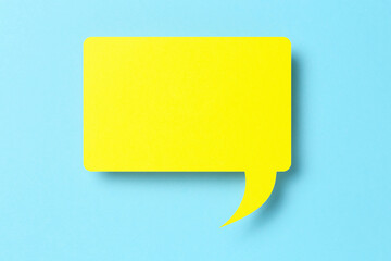 yellow paper speech bubble