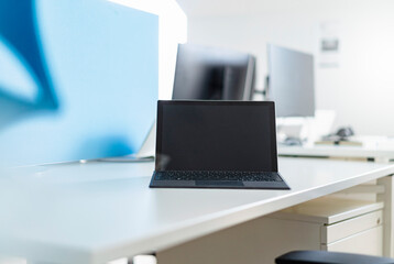 Digital tablet on desk at place of work