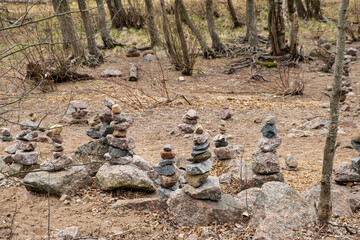 zen stack of rocks stones in dark forest a symbol of harmony and balance