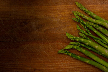 Asparagus spear  on wooden chopping board background .healthy eating concept.