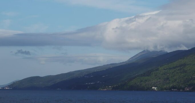 Timelapse of the clouds below the Ucka mountain and the Adriatic Sea Croatia