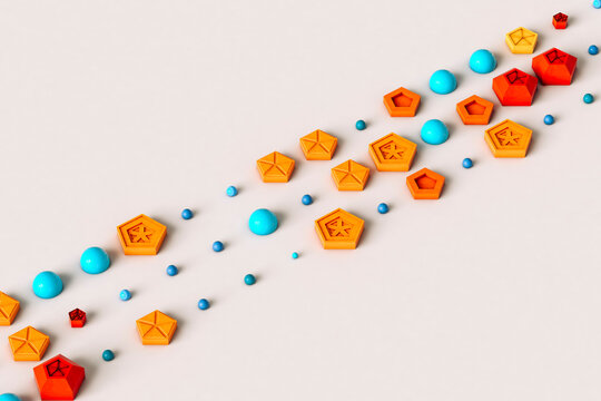 Studio shot of rows of colorful pentagons, spheres and hemispheres