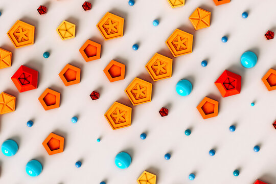 Pattern of colorful pentagons, spheres and hemispheres