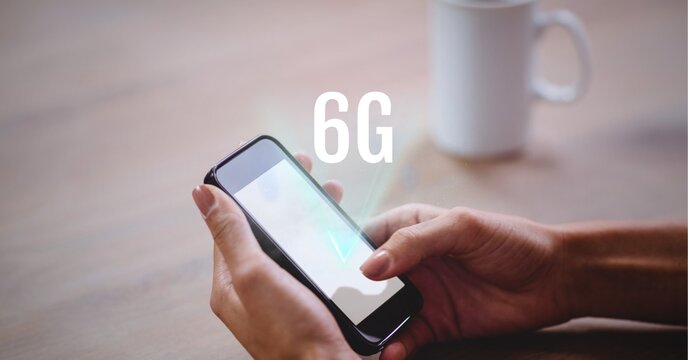 Composition of 6g text over woman holding smartphone in background - Powered by Adobe