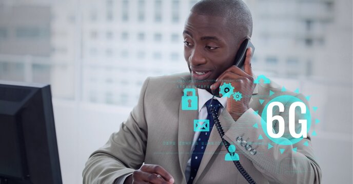Composition of 6g text and icons over african american businessman talking on phone in office
