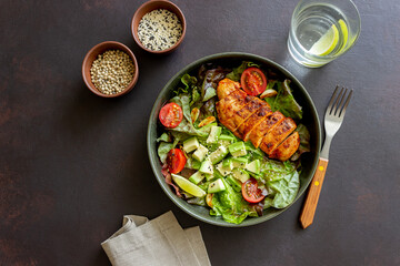 Salad with chicken, avocado and tomatoes. Healthy eating. Vegetarian food.