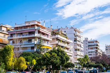 Fotobehang beautiful streets of Athens with blocks of flats, cars and shops © Roberto Sorin
