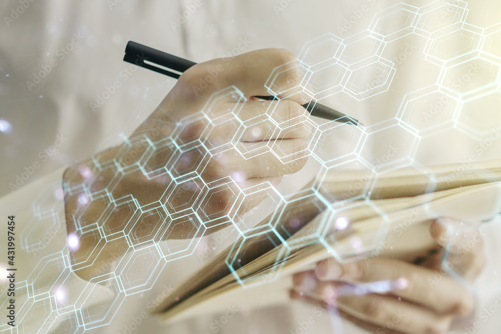 Poster creative abstract wireless technology hologram with hexagon and man hand writing in diary on backgro