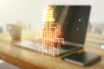 Creative light bulb illustration with microcircuit and modern desktop with pc on background, future technology concept. Multiexposure