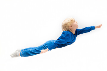 Little boy flying like superman isolated on white background.