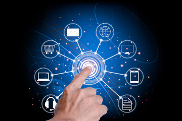 The man's hand pointing to press the center of the hitech circle symbol. The meaning of online communication, shopping, messages, e-mail via the Internet network.