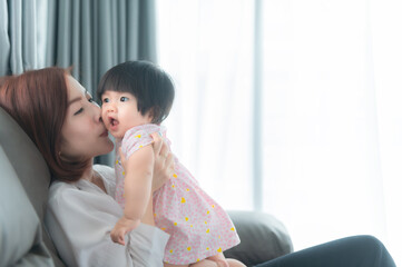 Mother and daughter newborn in home,Happy time of family,Single mom concept,Concept mother day