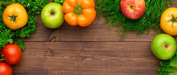 Selection of fresh products for preparing healthy and delicious vegetarian and vegan food. Various vegetables and fruits lie on the table. Flat lay.