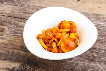 Marinated pickled honey mushrooms in the bowl