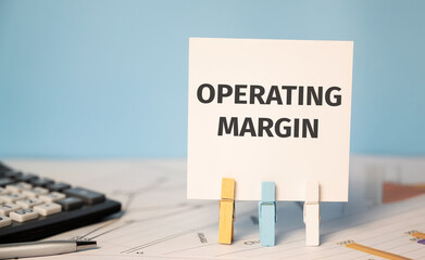 OPERATING MARGIN. Finances and business concept. Financial reports and calculator.