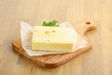 Maasdam cheese over the board