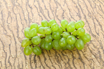 Ripe sweet green grape branch